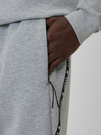 brīvā laika bikses trousers cold light grey melange 4f wss26ttrom1443 27m 2