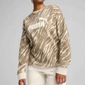 Puma ESS+ ANIMAL AOP Crew FL Alpine Snow