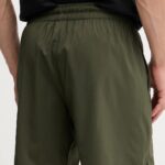 sporta šorti m tad essentials 7 woven short dark oli pu 525910 70 1